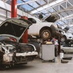 closeup car in repair station and body shop with soft-focus and over light in the background